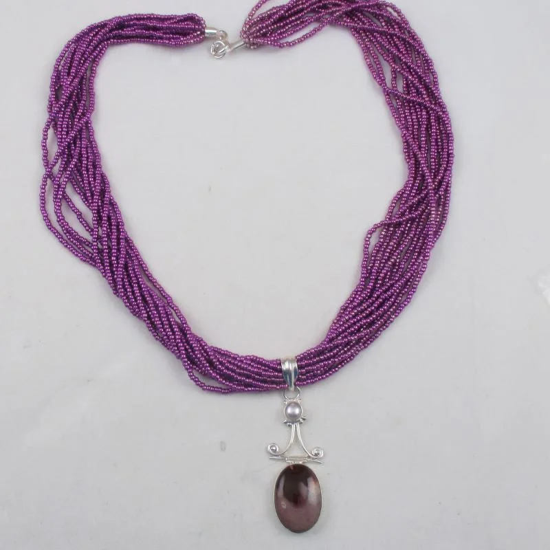 Cut-out necklace-Mookaite Pendant on Fuchsia Multi-strand Necklace